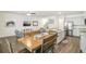 Open concept kitchen with stainless steel appliances and an island at 174 Hampton Cir, Mcdonough, GA 30253
