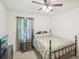 Bright bedroom with a queen-size bed and a nightstand at 174 Hampton Cir, Mcdonough, GA 30253