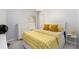 Well-lit bedroom with a lemon-themed bedspread and dresser at 239 Brookhaven Ct, Acworth, GA 30102