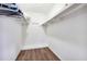 Spacious walk-in closet with ample shelving and hanging space at 6851 Roswell Rd # E1, Atlanta, GA 30328