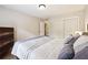 Spacious bedroom with a large bed, dresser, and ample closet space at 6851 Roswell Rd # E1, Atlanta, GA 30328