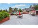 Community pool with patio tables and lounge chairs at 6851 Roswell Rd # E1, Atlanta, GA 30328