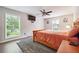 Spacious main bedroom with a ceiling fan, large windows, and plenty of natural light at 6851 Roswell Rd # E1, Atlanta, GA 30328