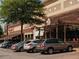 Cars parked in front of retail stores at Halcyon at 613 Skytop Dr, Cumming, GA 30040