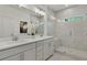 Double vanity bathroom with a large walk-in shower at 1094 Battery Park Rd, Decatur, GA 30033