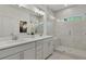 Elegant bathroom with double vanity, large shower, and modern fixtures at 1096 Battery Park Rd, Decatur, GA 30033