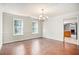Bright dining room with hardwood floors and a chandelier at 2049 Town Square Dr, Mcdonough, GA 30253