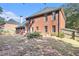 Brick house exterior with a large backyard at 2049 Town Square Dr, Mcdonough, GA 30253