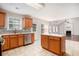 Kitchen with island, stainless steel appliances, and wood cabinets at 2049 Town Square Dr, Mcdonough, GA 30253