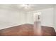 Spacious living room with hardwood floors and an open floor plan at 2049 Town Square Dr, Mcdonough, GA 30253