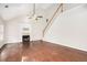 Vaulted ceiling Gathering room with fireplace and hardwood floors at 2049 Town Square Dr, Mcdonough, GA 30253