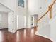 Bright and spacious entryway with hardwood floors and staircase at 2049 Town Square Dr, Mcdonough, GA 30253