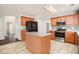 Kitchen boasts stainless steel appliances and an island at 2049 Town Square Dr, Mcdonough, GA 30253
