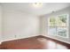 Bright home office with hardwood floors and large windows at 2049 Town Square Dr, Mcdonough, GA 30253