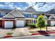 Brick townhouse with two-car garage and landscaping at 1798 Willow Branch Nw Ln # F, Kennesaw, GA 30152