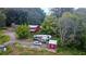 Aerial view of a rural property with a house, RV, and shed at 268 Arnold Mill Rd, Woodstock, GA 30188