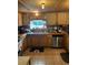 Kitchen with wooden cabinets, stainless steel appliances, and tile floor at 268 Arnold Mill Rd, Woodstock, GA 30188
