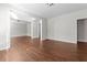 Open living room with hardwood floors and neutral walls at 906 Fox Croft Pl, Canton, GA 30114