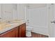 Bathroom with tub shower combo, wood flooring, and granite vanity at 906 Fox Croft Pl, Canton, GA 30114