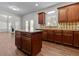 Open concept kitchen with island and view into Gathering room at 906 Fox Croft Pl, Canton, GA 30114