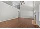 Spacious living room featuring hardwood floors, fireplace, and high ceilings at 906 Fox Croft Pl, Canton, GA 30114
