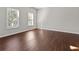 Spacious bedroom with hardwood floors and large windows at 906 Fox Croft Pl, Canton, GA 30114