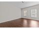 Spacious bedroom with hardwood floors and large windows at 906 Fox Croft Pl, Canton, GA 30114