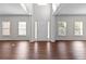Bright foyer with hardwood floors and neutral walls at 906 Fox Croft Pl, Canton, GA 30114