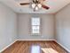 Bright bedroom with hardwood floors and ceiling fan at 1458#0 Brandon Sqs, Lawrenceville, GA 30044