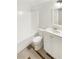 Clean bathroom, featuring a white vanity, bathtub and tile floor at 1116 Fieldstone Dr, Canton, GA 30114