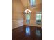 Formal dining room with hardwood floors, chandelier, and large windows at 7025 Fletcher Dr, Winston, GA 30187