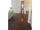 Hardwood floors throughout this spacious hallway at 7025 Fletcher Dr, Winston, GA 30187