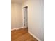 Simple basement room with wood-look vinyl flooring at 7025 Fletcher Dr, Winston, GA 30187