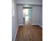 Finished basement with new vinyl flooring and neutral walls at 7025 Fletcher Dr, Winston, GA 30187