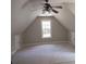 Spacious bonus room with vaulted ceiling and large window at 7025 Fletcher Dr, Winston, GA 30187