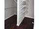 Walk-in closet with wire shelving and dark hardwood floors at 7025 Fletcher Dr, Winston, GA 30187