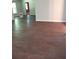 Finished basement with dark brown vinyl flooring at 7025 Fletcher Dr, Winston, GA 30187