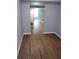 Finished basement with new vinyl flooring and neutral walls at 7025 Fletcher Dr, Winston, GA 30187