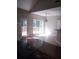 Bright dining room with hardwood floors and large windows at 7025 Fletcher Dr, Winston, GA 30187