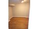 Spacious basement room with wood-look vinyl flooring at 7025 Fletcher Dr, Winston, GA 30187
