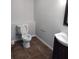 Basement bathroom with brown tile floor and white vanity at 7025 Fletcher Dr, Winston, GA 30187