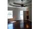 Main bedroom with hardwood floors and ensuite bathroom at 7025 Fletcher Dr, Winston, GA 30187