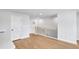 Upstairs hallway with hardwood floors and staircase railing at 1927 Rogers Ct, Atlanta, GA 30318