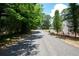 Residential street view showing a quiet neighborhood setting at 4480 Gann Xing, Smyrna, GA 30082