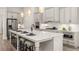 Spacious kitchen with island, stainless steel appliances, and white cabinets at 3378 Chosen Blvd, Snellville, GA 30078