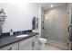 Clean bathroom with a single vanity and shower/tub combo at 3378 Chosen Blvd, Snellville, GA 30078