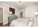 Bright bedroom with a comfortable bed and wooden floors at 3378 Chosen Blvd, Snellville, GA 30078
