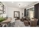 Home office with large mirror and comfortable seating at 3378 Chosen Blvd, Snellville, GA 30078
