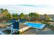 Community pool, clubhouse, and tennis courts at 1931 Lacebark Elm Way, Lawrenceville, GA 30045