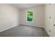 Well-lit bedroom with grey carpet and a window at 315 Smith Ferguson Rd, Dallas, GA 30157